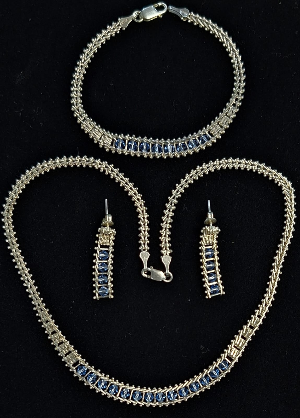 SET DE COLLAR CON INCRUSTACIONES DE TOPACIO AZUL EN PLATA LEY 925
