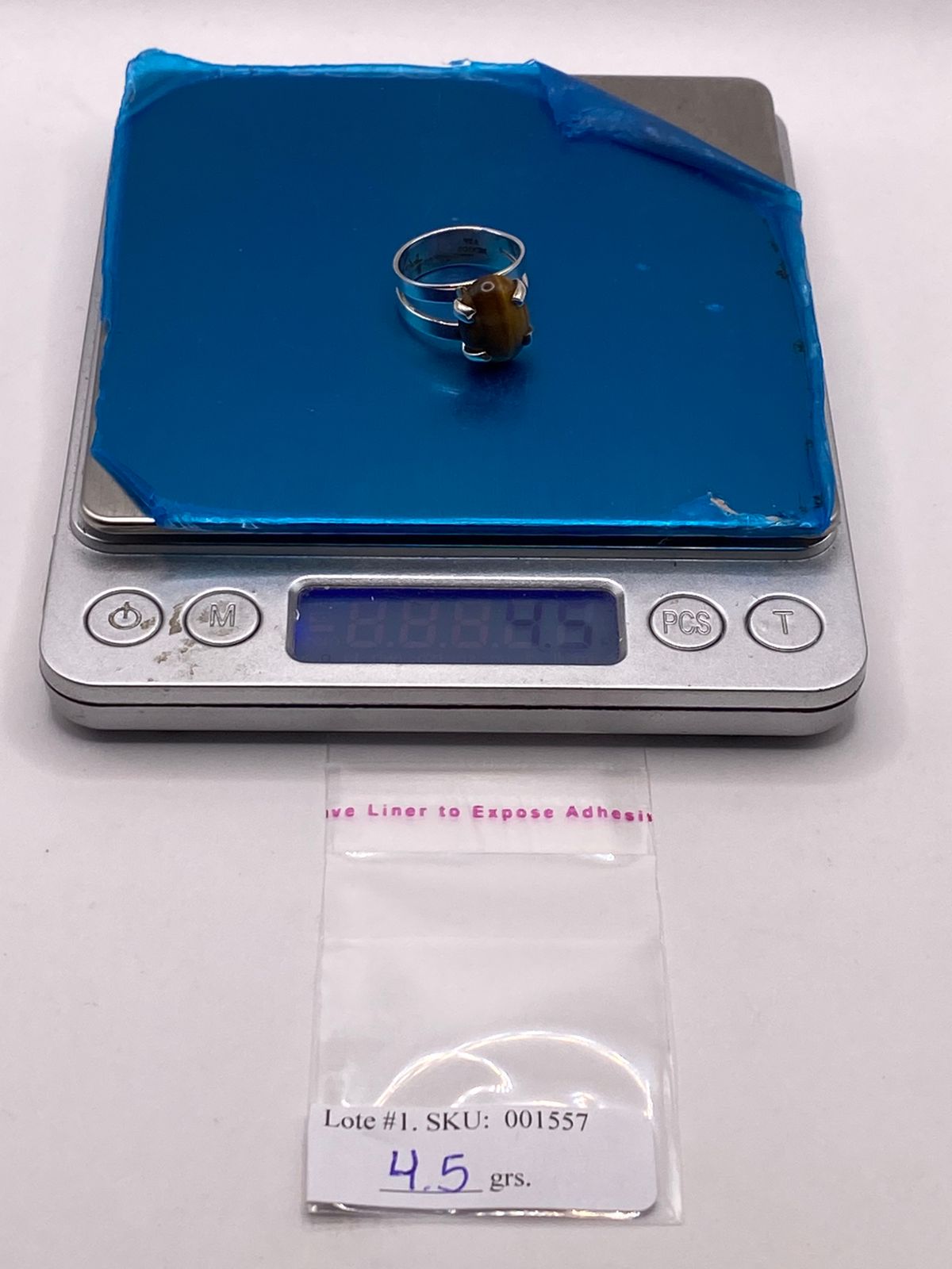 ANILLO ARTESANAL DE PLATA LEY 925 CON OJO DE TIGRE NATURAL