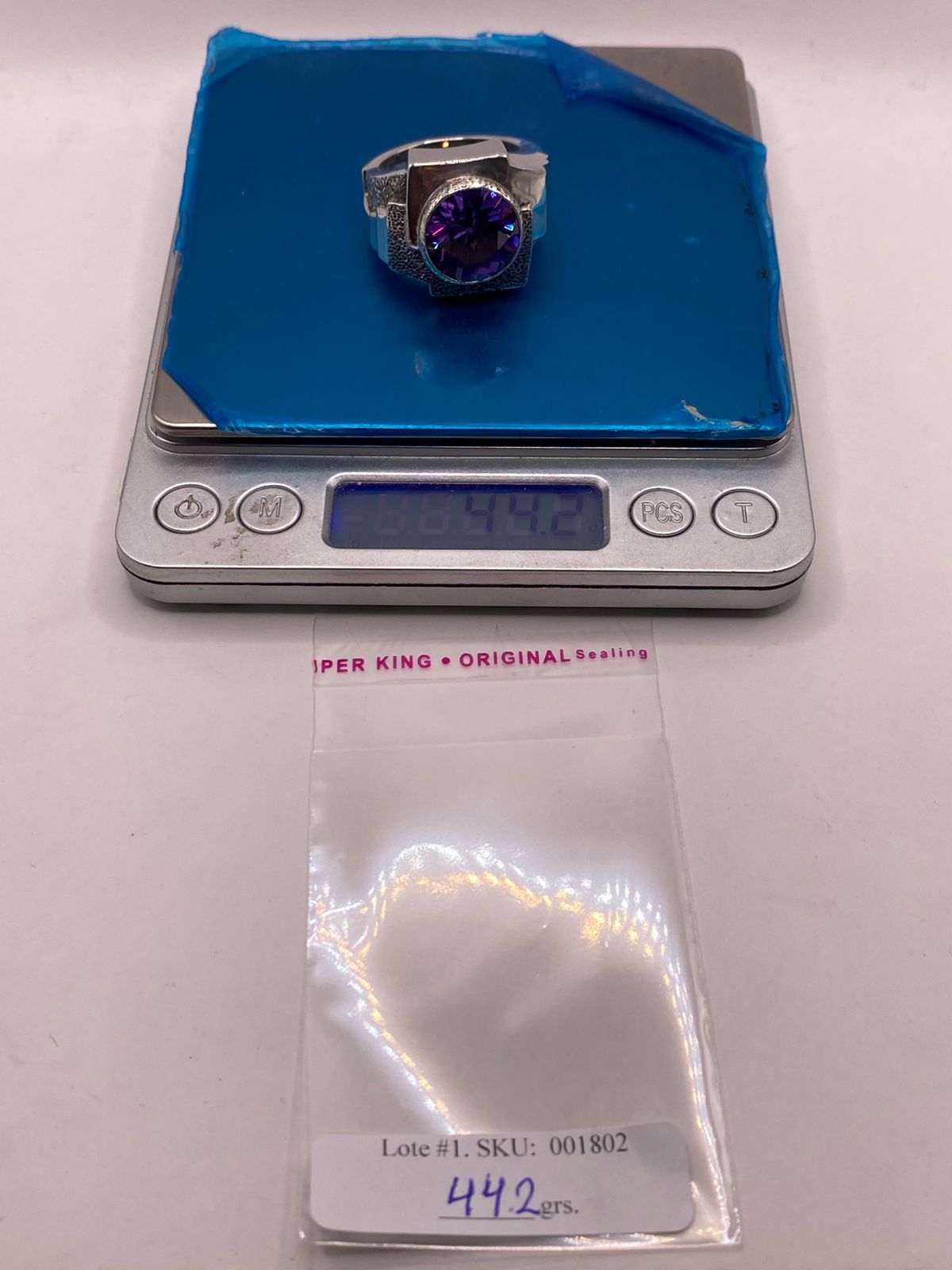 ANILLO ARTESANAL DE PLATA CON PIEDRA TORNASOL FACETADA