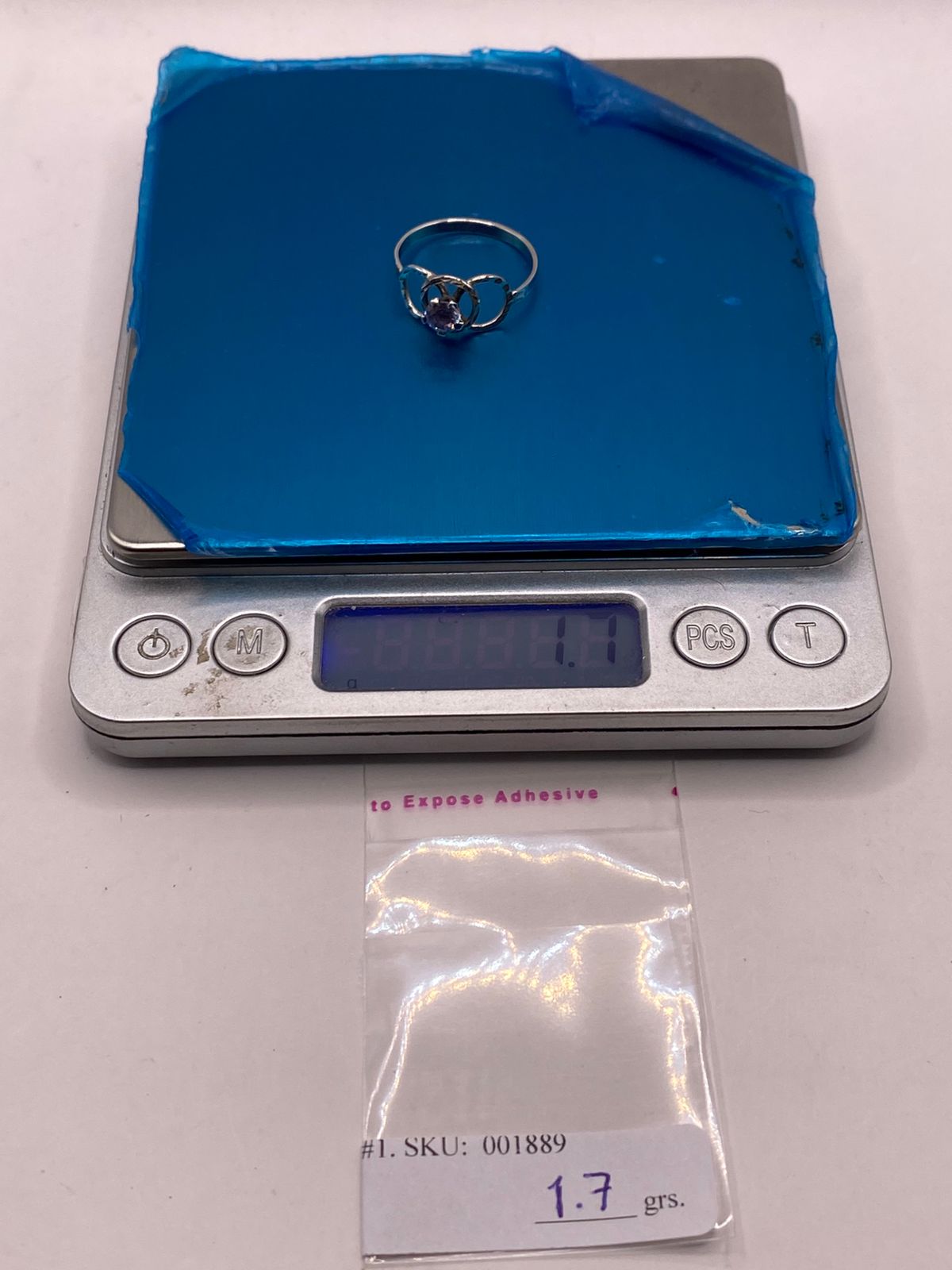 ANILLO ELEGANTE CON ZIRCONIA LILA EN PLATA LEY 925