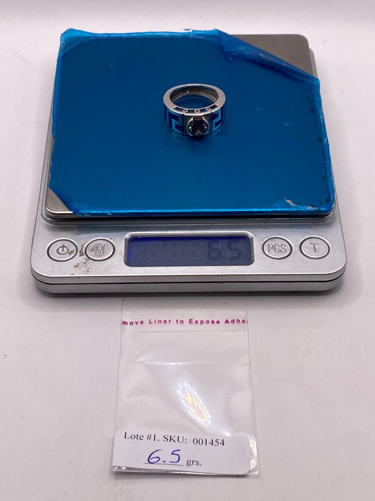 ANILLO GEOMÉTRICO DE PLATA LEY 925 CON ÓPALO DE FUEGO Y ZIRCONIA TORNASOL