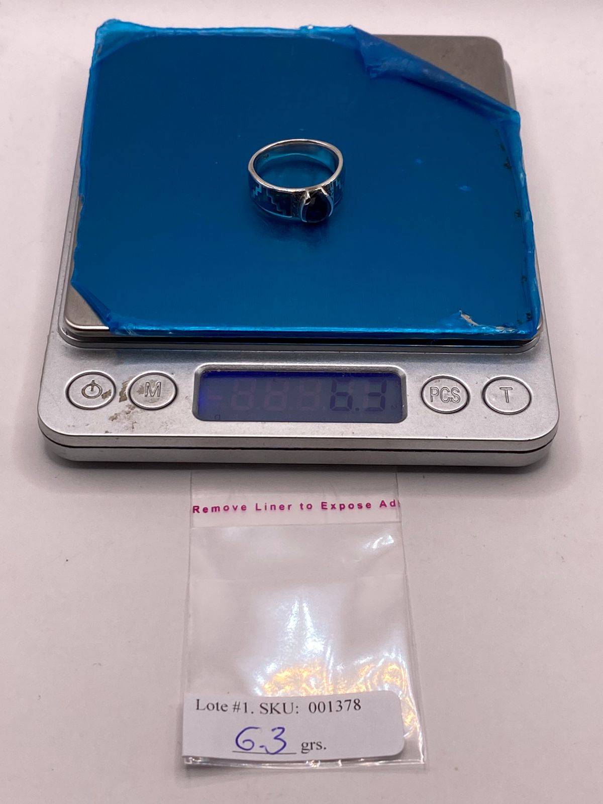 ANILLO GRECA CON ÓPALO DE FUEGO Y ZIRCONIA EN PLATA LEY .950