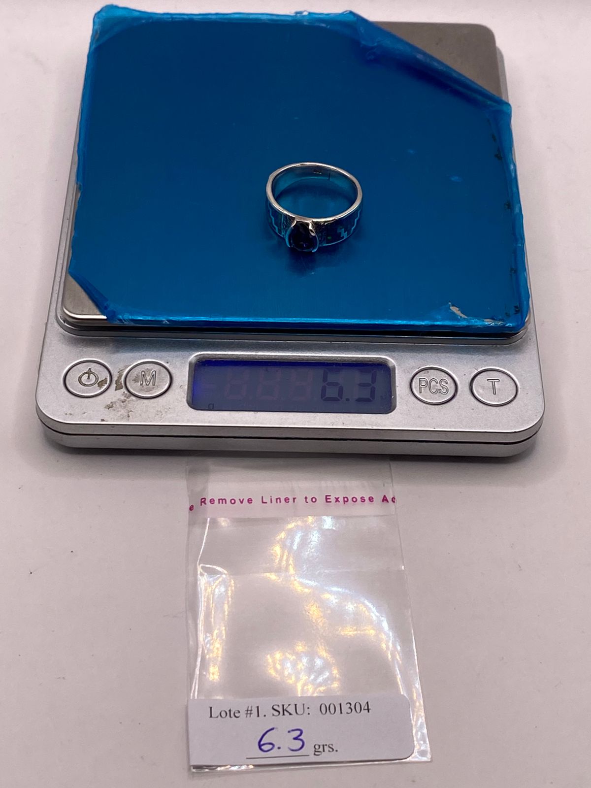 ANILLO DE PLATA .950 CON ZIRCONIA AZUL Y ÓPALO DISEÑO GRECA