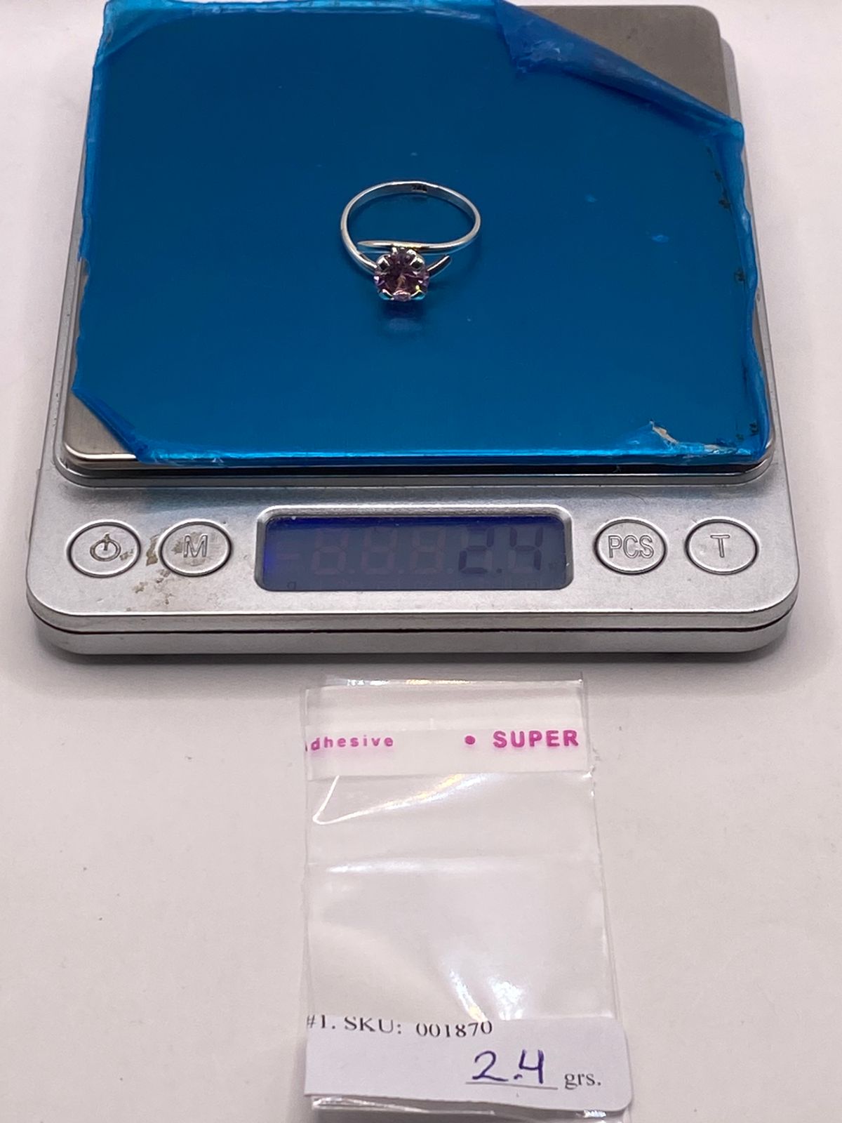 ANILLO SOLITARIO CRUZADO DE PLATA LEY 925 CON ZIRCONIA ROSA