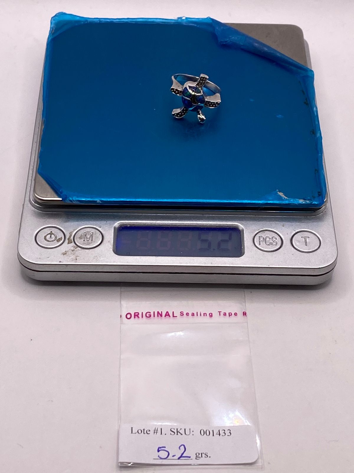 ANILLO TORTUGA MARINA DE PLATA LEY 950 CON ÓPALO DE FUEGO