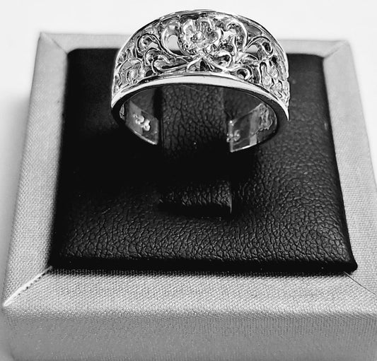 ANILLO  DE FLORES EN PLATA LEY 925