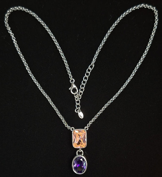 COLLAR CON INRUSTACIONES DE TOPACIO ROSA Y AMATISTA EN PLATA LEY 925