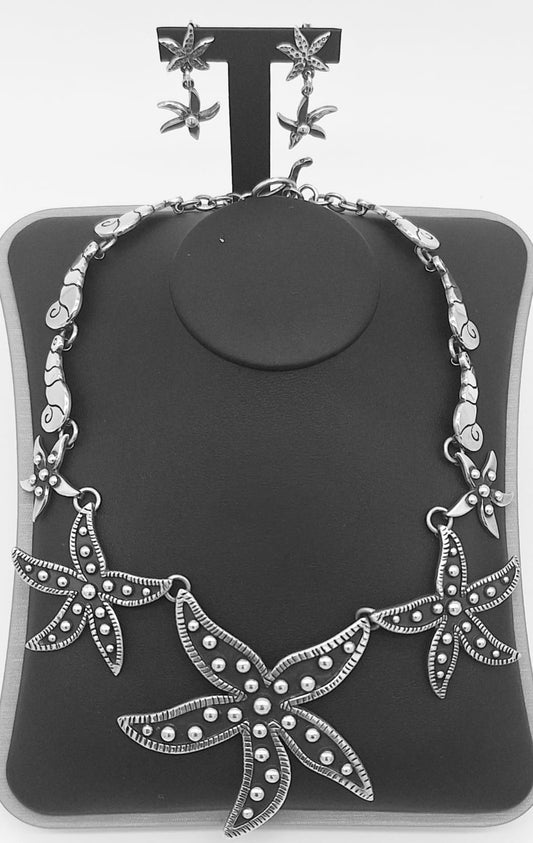 SET DE COLLAR Y ARETE,  ESTRELLA DE MAR DE PLATA LEY 925.