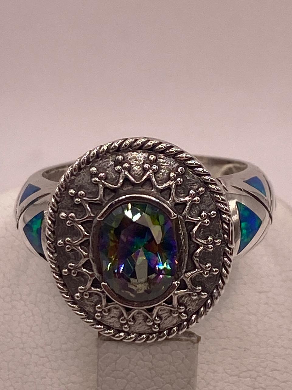 ANILLO ARTESANAL CON ÓPALO DE FUEGO, ZIRCONIA Y MARQUESITA EN PLATA LEY .950