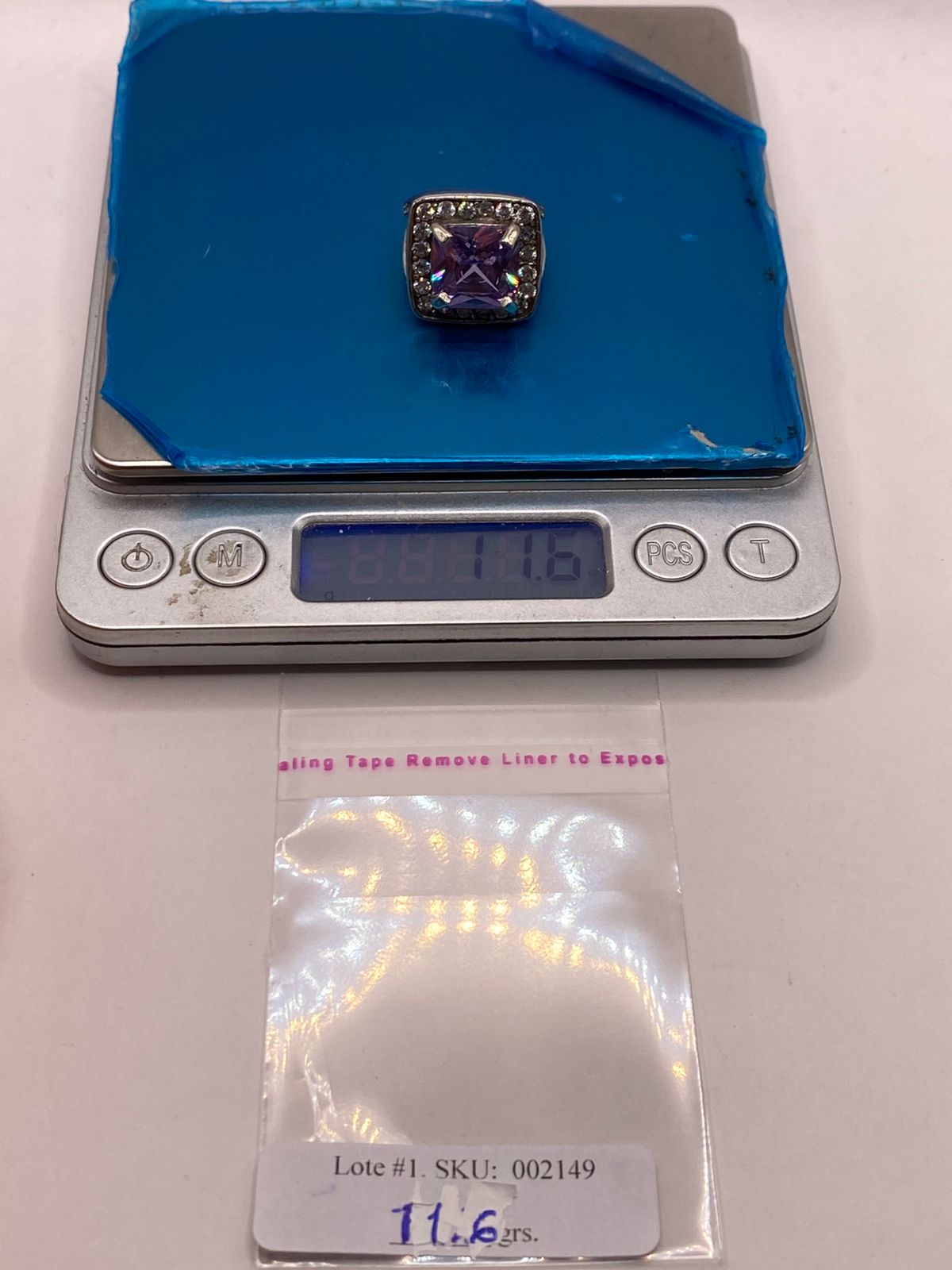 Anillo de zirconia cuadrada con peso en gramos 