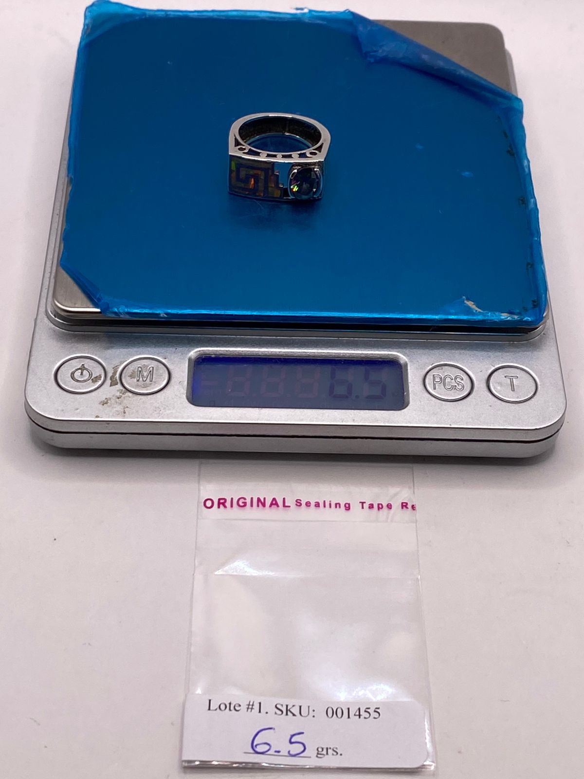 ANILLO GEOMÉTRICO DE PLATA LEY 925 CON ÓPALO DE FUEGO Y ZIRCONIA TORNASOL