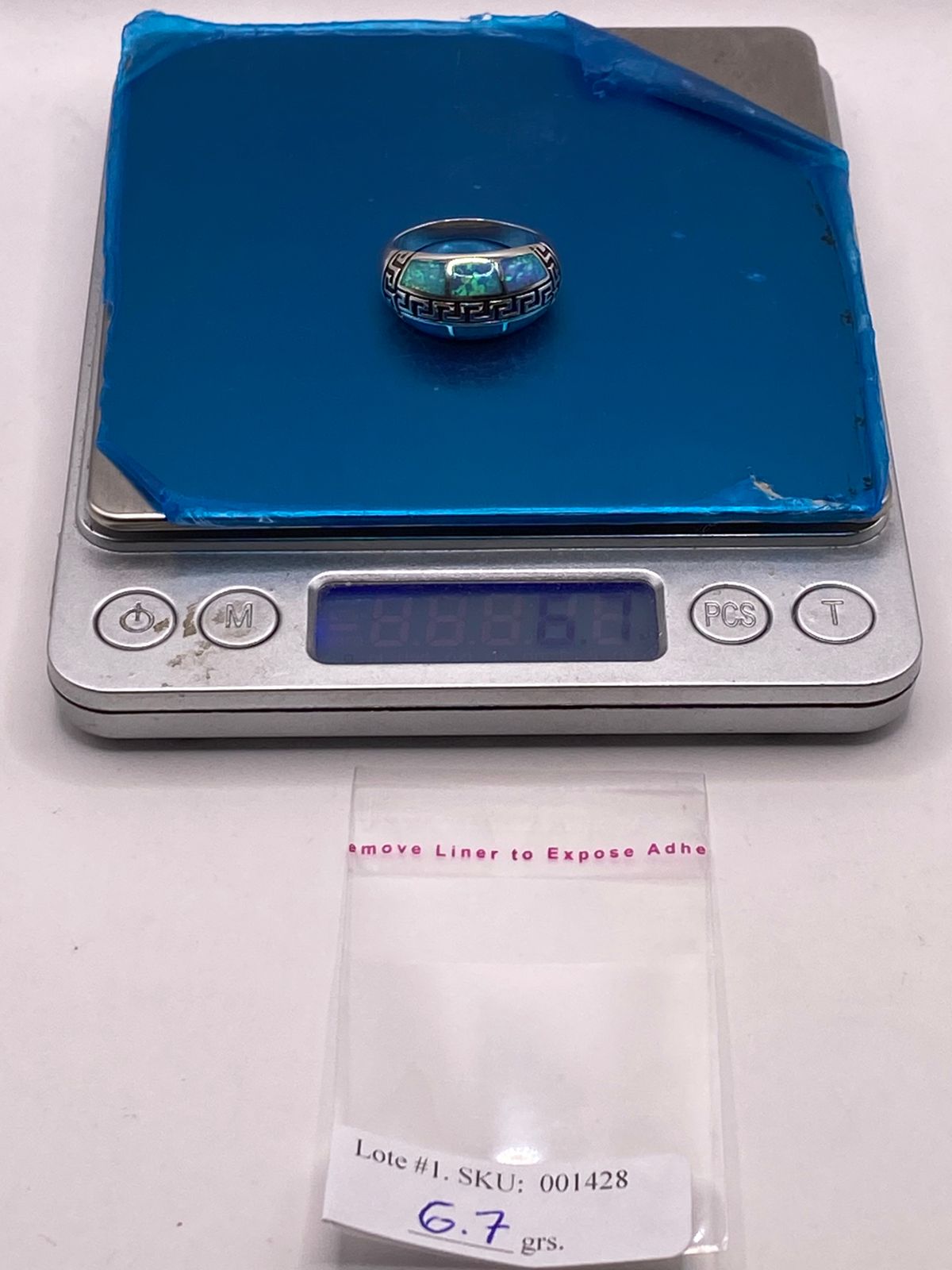 ANILLO GRECA DE PLATA LEY 950 CON ÓPALO DE FUEGO AZUL CIELO