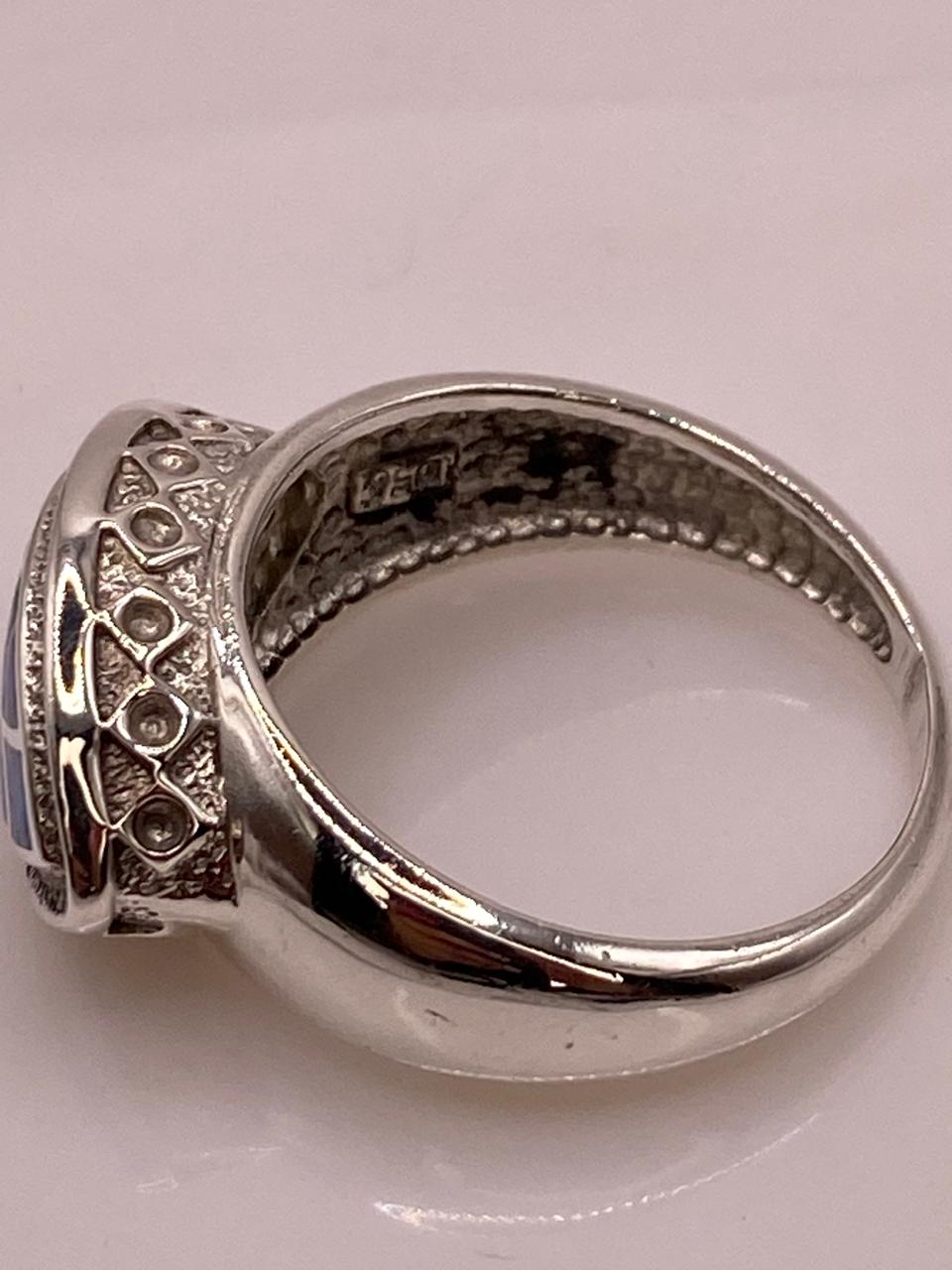 💍 ANILLO OVALADO CON ÓPALO DE FUEGO EN PLATA LEY .950