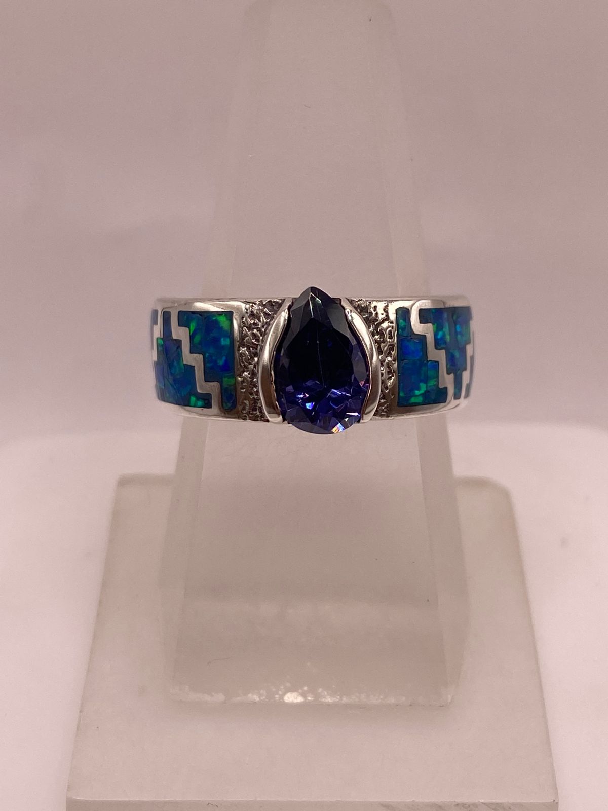 ANILLO DE PLATA .950 CON ZIRCONIA AZUL Y ÓPALO DISEÑO GRECA