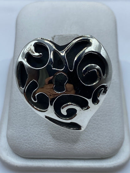 Anillo ajustable de plata calado con motivos geométricos en vacío