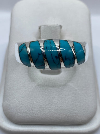 Anillo de plata .925 con turquesa azul cielo engastada en bandas alternas