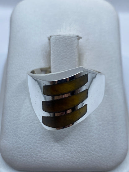 Anillo de plata con piedra café y bandas modulares, vista frontal