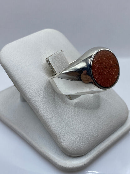 Anillo unisex de Taxco en plata maciza, 17 gramos, mostrado de costado