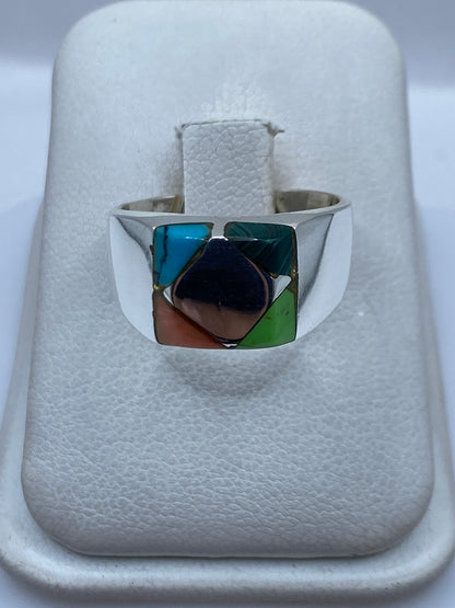 Anillo de plata .925 con turquesa azul cielo engastada en diseño geométrico