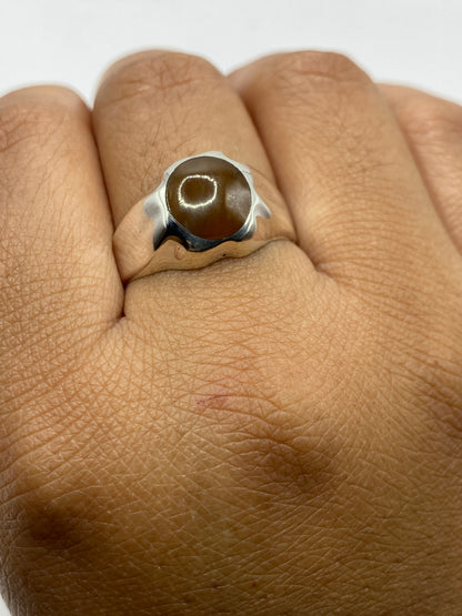 Anillo de plata Taxco en balanza mostrando 7.5 gramos