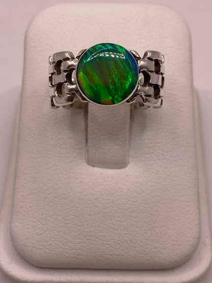 Anillo Artesanal con Ópalo de Fuego Verde en Plata .950, sello de autenticidad Plata Ley .925