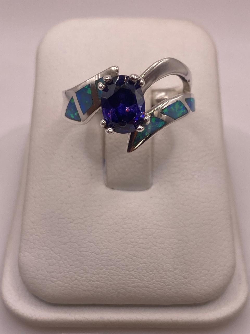 Anillo Contemporáneo Abierto con Ópalo de Fuego  y Zirconia  en Plata .950