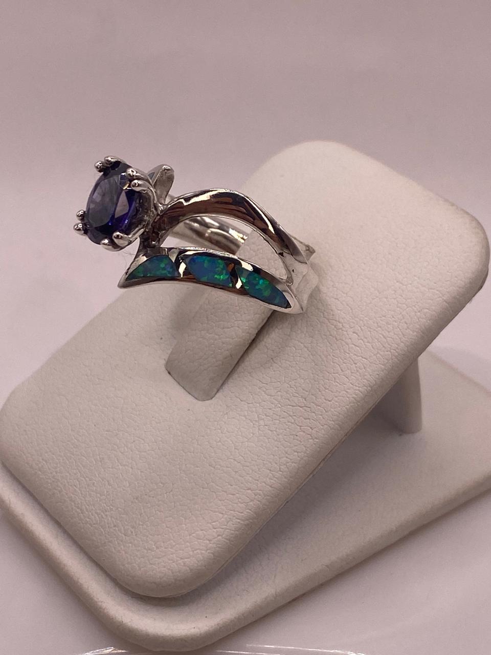 Anillo Contemporáneo Abierto con Ópalo de Fuego  y Zirconia  en Plata .950