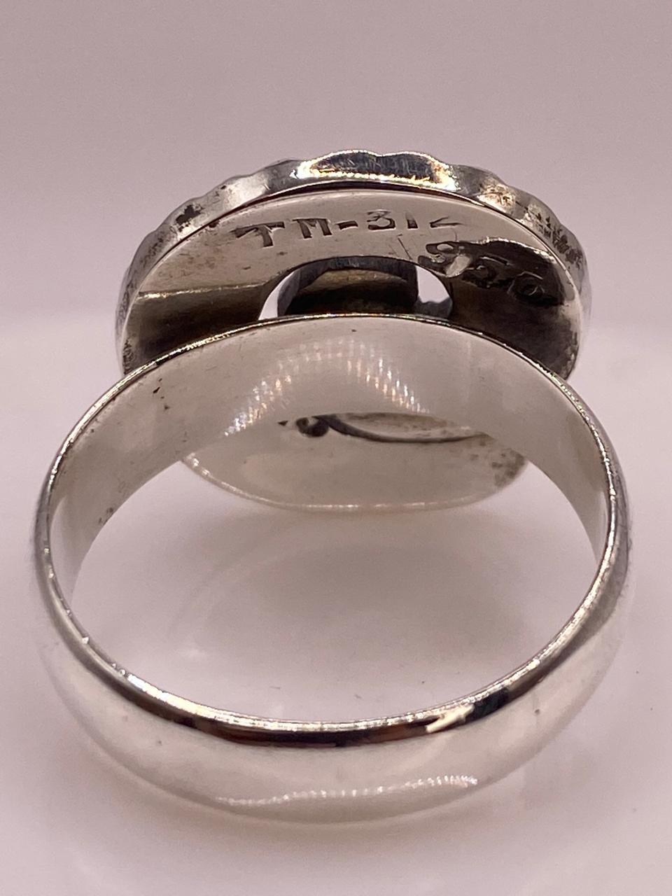 Anillo en Espiral con Ópalo de Fuego Tornasol en Plata .950