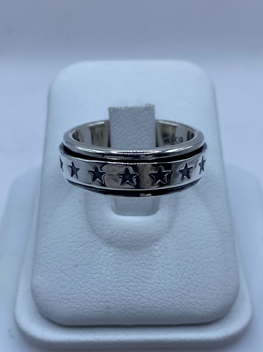 Anillo Giratorio de Plata 925 con Diseño de Estrellas — vista lateral