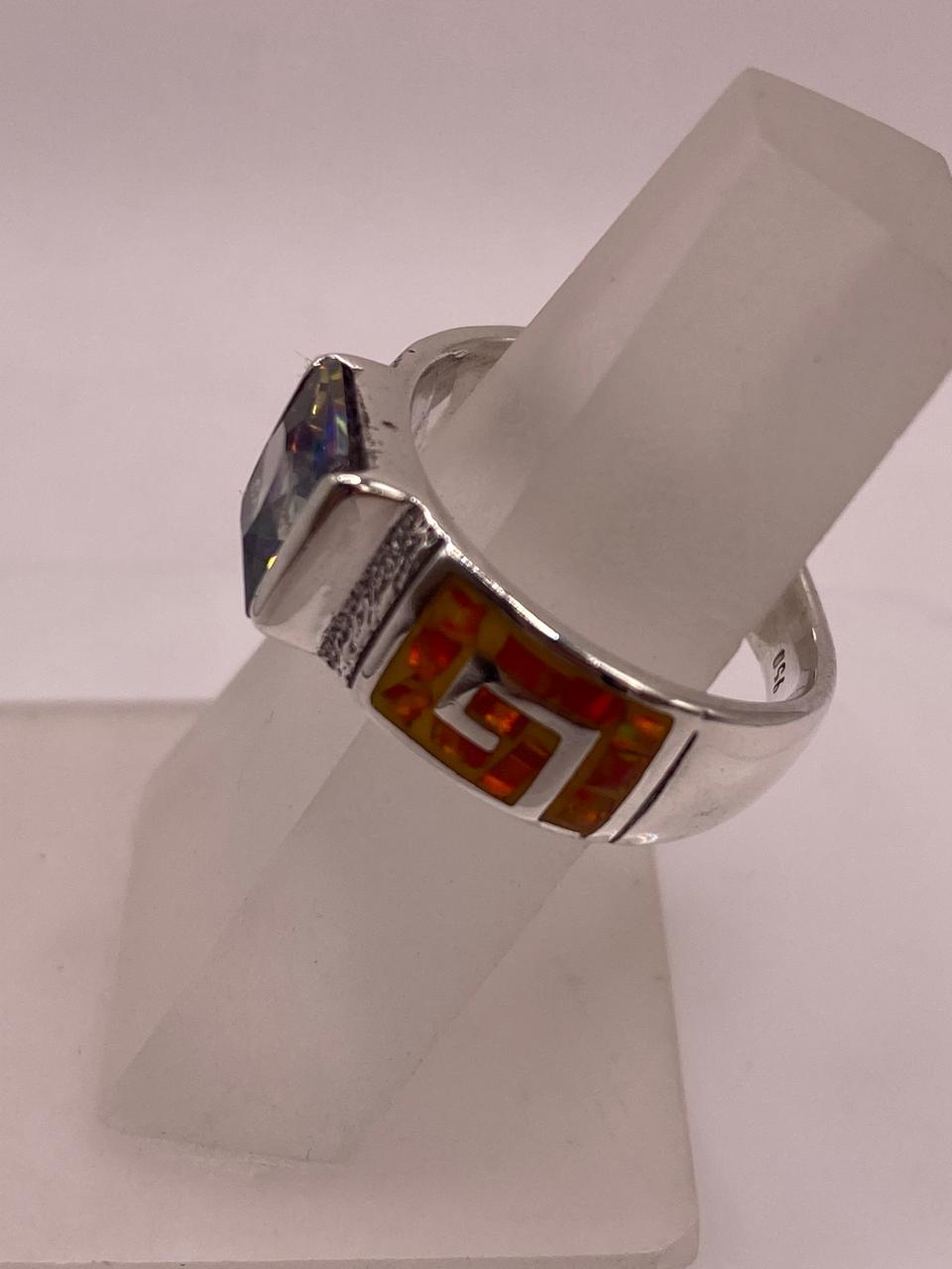 Anillo Greca de Plata 950 con Ópalo de Fuego y Zirconia