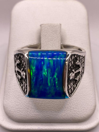 Anillo de Ópalo Azul con Detalle de Ancla en Plata .925