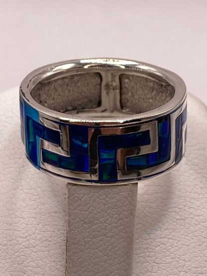 Anillo con Ópalo de Fuego Azul‑Verde Diseño Greca en Plata Ley 950, vista superior