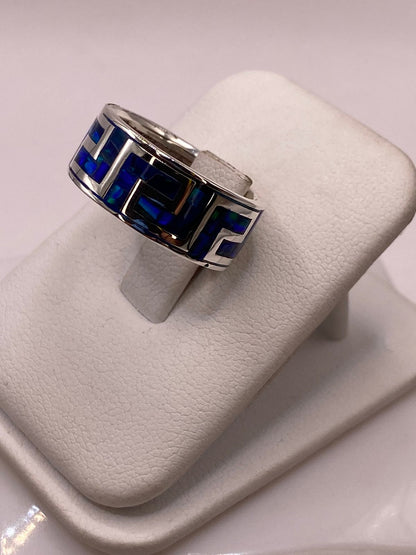 Anillo con Ópalo de Fuego Azul‑verde Diseño Greca en Plata Ley 950, vista frontal