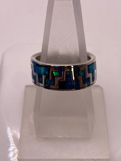 Anillo de Ópalo de Fuego Azul‑Verde con Diseño Geométrico en Plata Ley 950
