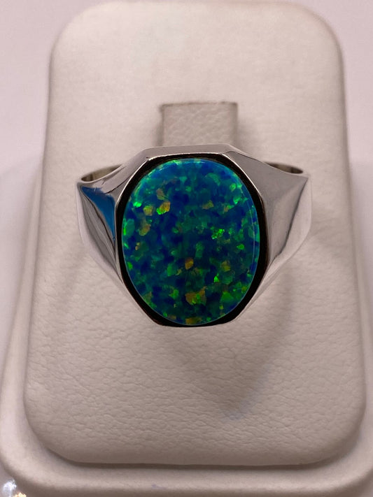 🔥 Anillo con Ópalo de Fuego Azul‑verde Ovalado en Plata Ley 950 en báscula mostrando peso