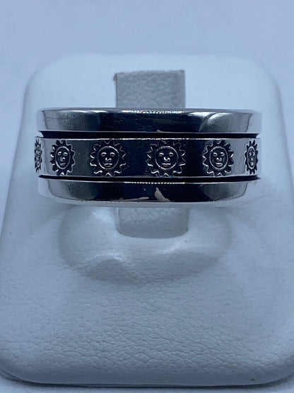 Anillo Spinner de Plata .925 con Diseño de Soles — vista lateral