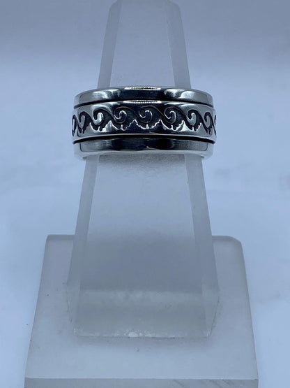 Anillo Spinner de Plata .925 con Diseño de Olas, sello de autenticidad Plata Ley .925