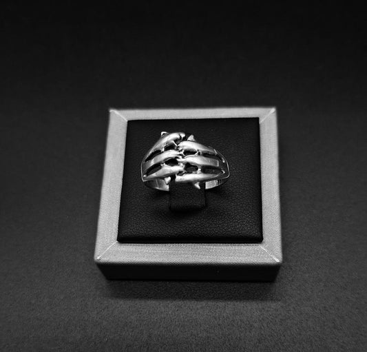 ANILLO DE SEIS DELFINES EN PLATA LEY 925