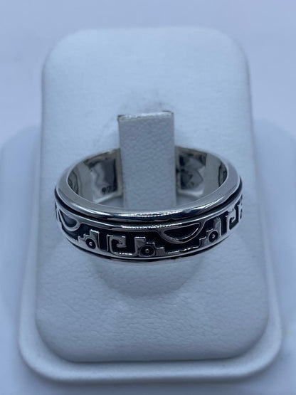 Perfil lateral anillo spinner plata 925 diseño simbólico oxidado y rieles pulidos, talla 9 Arte Taxco