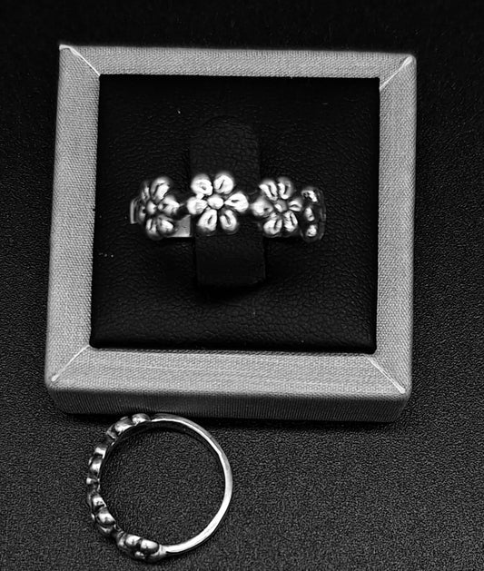 ANILLO FLORES EN PLATA LEY 925
